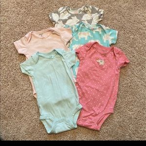 Quantity: 9, size 6 month girl onesies